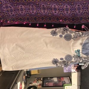 white with blue design body fitting dress